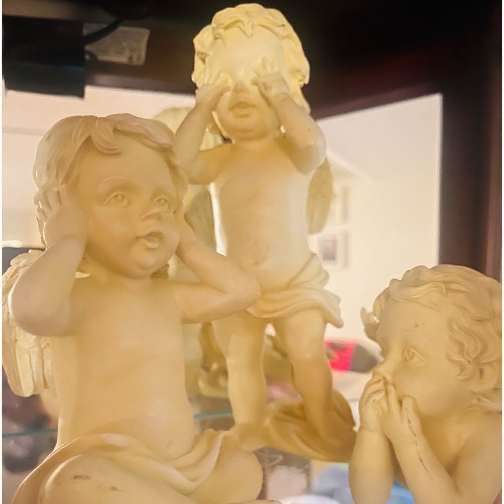 Angels speak hear see mo evili and i am adding several smaller angela 1 big